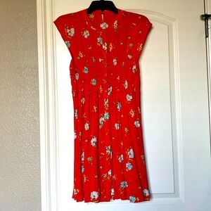Women’s Free People size small dress, smocked detail around bodice, fun orange